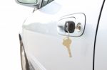 Two Keys On Car Doos At Parking Stock Photo