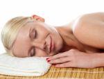 Spa Woman Relaxing In Bamboo Mat Stock Photo