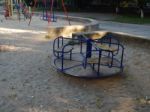 Children Playground, Swing Near The House  Stock Photo