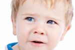 Toddler Blond And Blue Eyes Boy Child With Various Facial Expres Stock Photo