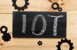 Blackboard Written With The Letters Iot, The Internet Of Things Stock Photo