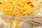 Italian Pasta Penne With Wheat Stock Photo