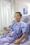 Old Man Patient Feeding Liquid Food On Hospital Bed Stock Photo