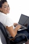 Young Beautiful Female Working On Laptop Stock Photo