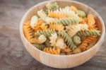 Fusili Pasta In Wooden Plate Stock Photo