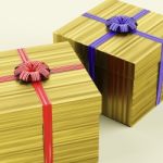 Gold Gift Boxes With Ribbon Stock Photo