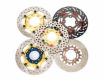 Isolated Group Of New Disc Brake For Motorcycle Stock Photo