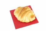 One Fresh Croissant On A Red Napkin Stock Photo