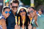 Portrait Of Group Of Friends Eating Ice Cream Stock Photo