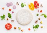 The Ingredients For Homemade Pizza On White Wooden Background Stock Photo