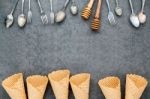 Flat Lay Ice Cream Cones Collection , Spoons ,fork And Honey Dip Stock Photo