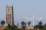 New Windmills And Old Church At Winterton-on-sea Stock Photo