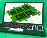 Health Check On Laptop Showing Medical Exams Stock Photo