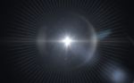 Beautiful Blue Digital Lens Flare In Black Background Horizontal Frame Stock Photo