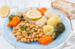 Codfish With Chickpeas And Vegetables Stock Photo