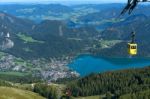 Zwölferhorn Mountain Cable Car Running Down To St Gilgen Stock Photo