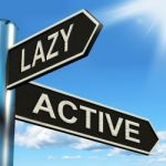 Lazy Active Signpost Shows Lethargic Or Motivated Stock Photo