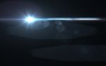 Abstract Lens Flare Light Over Black Background Stock Photo