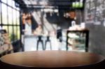 Selected Focus Empty Brown Wooden Table And Coffee Shop Or Resta Stock Photo