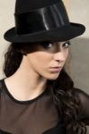 Attractive Women With Black Hat Stock Photo