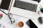 Work Space On Table With Laptop Computer Smartphone And Coffee Stock Photo