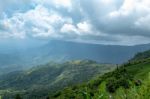 The Beauty Of The Sky When Light Hits The Clouds And Mountain Stock Photo