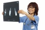 Asian Surgeon Showing Xray Report Stock Photo