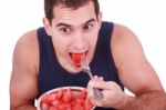 Young Man Eating Water Melon Stock Photo