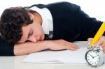 Schoolgirl Sleeping On Desk Stock Photo