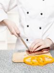 Chef Cutting Bacon Stock Photo