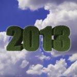 2013 New Year Sign Of Green Grass With Blue Sky. Eco Concept Stock Photo