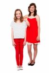 Young Teenage Sisters Standing Stock Photo