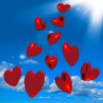 Red Hearts Falling From Sky Stock Photo