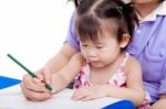 Mother With Child Girl Draw And Paint Together Stock Photo