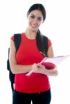 Young Student Holding Clipboard Stock Photo