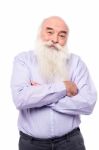 Hoary Old Man With Crossed Arms Over White Stock Photo