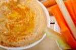 Fresh Hummus Dip With Raw Carrot And Celery Stock Photo