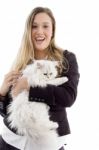 Female Model Standing With Cat Stock Photo