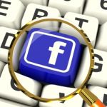 Facebook Key Magnified Means Connect To Face Book Stock Photo