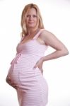 Pregnant Woman Holding Tummy Stock Photo