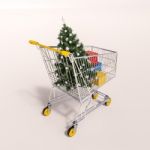 Shopping Cart Full Of Purchases In Packages And Christamas Tree Stock Photo