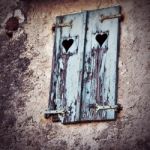 Wooden Window Shutters With Heart Shape Stock Photo