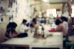 Blurred Childrens In The Art Room Background Stock Photo