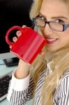 Businesswoman drinking coffee Stock Photo