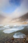 Fog Over Iceberg Lake, Glacier National Park Stock Photo