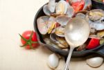 Fresh Clams On An Iron Skillet Stock Photo