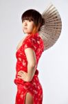 Chinese Model In Traditional Cheongsam Dress Stock Photo