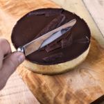 Fresh Classic Homemade Cheesecake With Dark Chocolate Topping Stock Photo