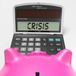 Crisis Calculator Shows Economic Panic And Worry Stock Photo