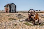 Old Shack And Rusty Machinery On Dungeness Beach Stock Photo